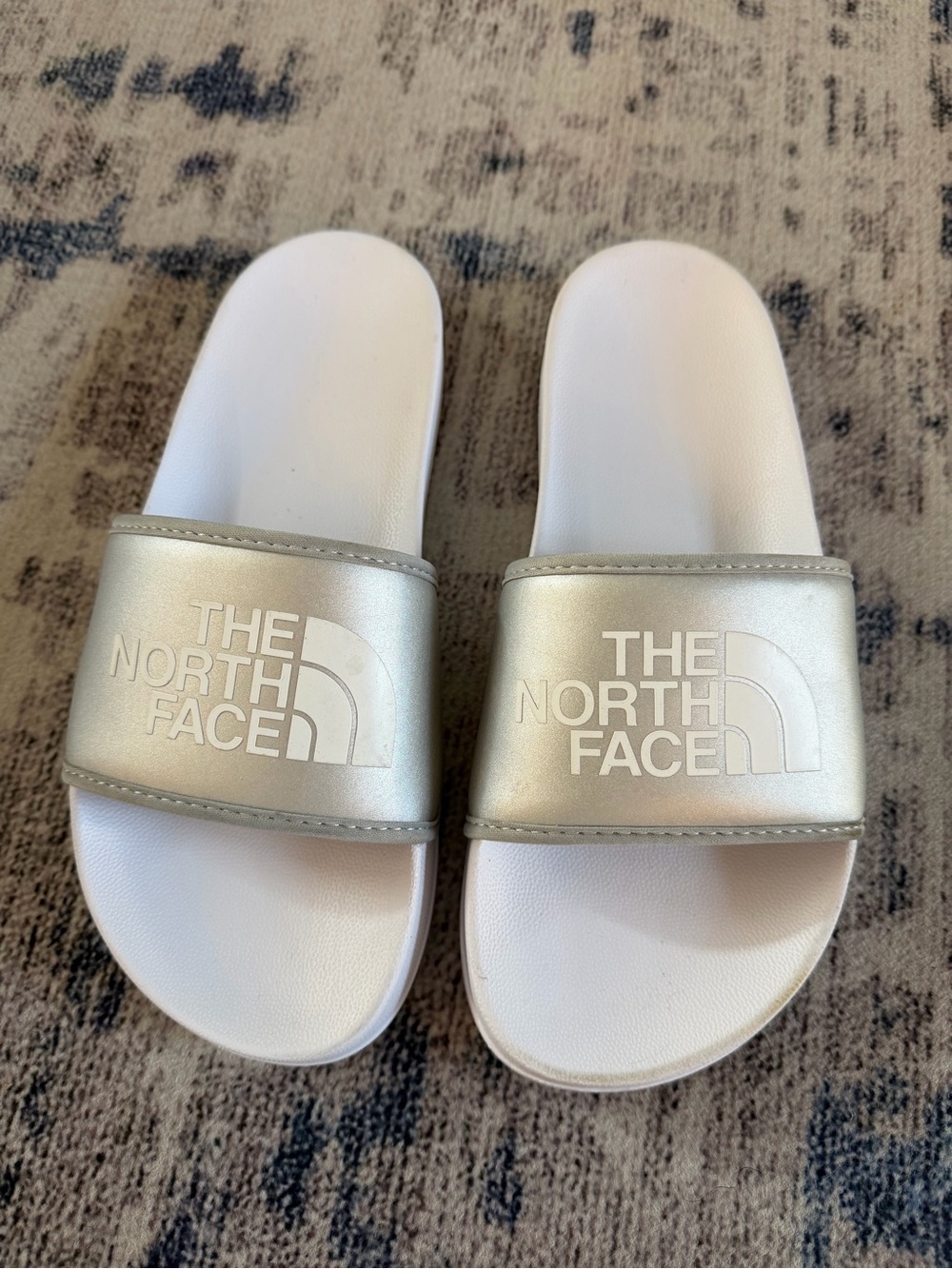 The North Face Silver and White Slide Sandals